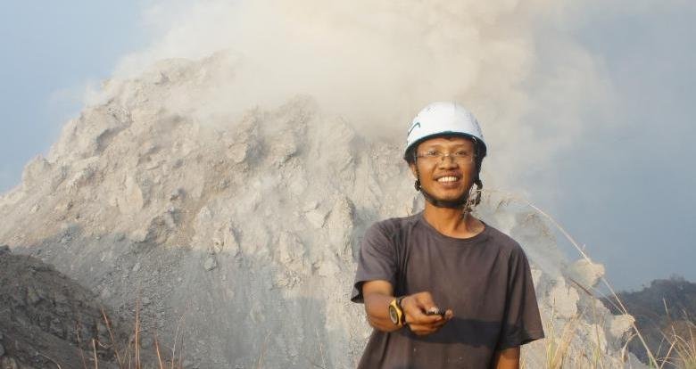Aris on behind of Active Lava Dome, Volcano Paluweh, Fores sea - Indonesia